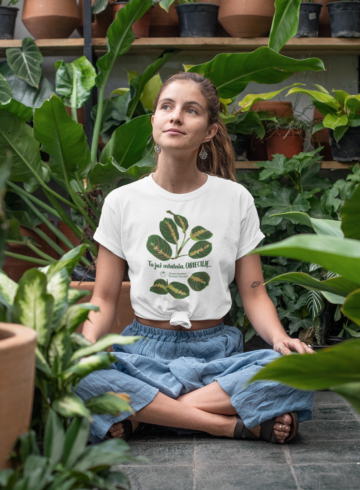t-shirt-mockup-of-a-relaxed-young-woman-sitting-in-a-greenhouse-27084