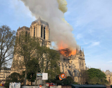 Notre Dame cathedral is burning in Paris, Monday, April 15, 2019. Massive plumes of yellow brown smoke is filling the air above Notre Dame Cathedral and ash is falling on tourists and others around the island that marks the center of Paris. (AP Photo)