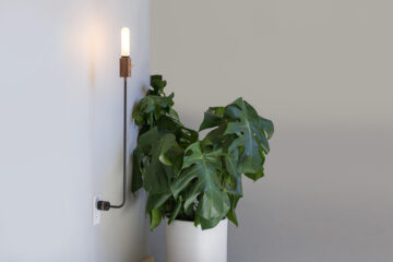 incredibly_light_wald_is_a_lamp_anchored_by_the_wall_socket_03